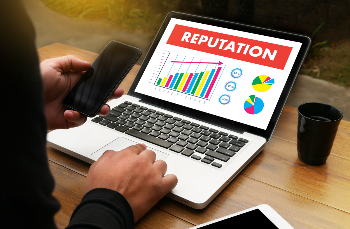 A laptop showing a page of a reputation management presentation